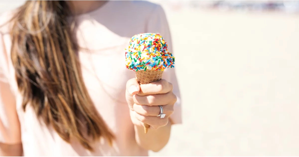 woman holding ice cream cone